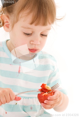 Image of little girl with strawberry