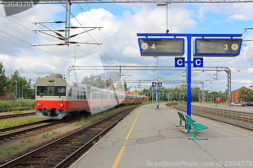 Image of Regional Train on Platform at Railway Station