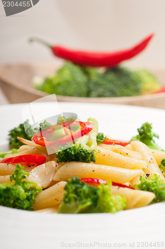 Image of Italian penne pasta with broccoli and chili pepper