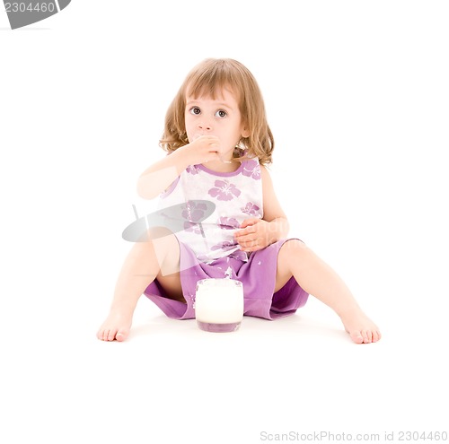 Image of little girl with yogurt