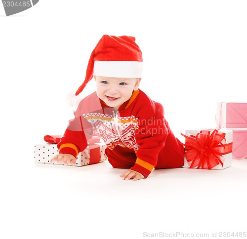 Image of santa helper baby with christmas gifts