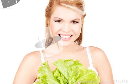 Image of happy woman with lettuce