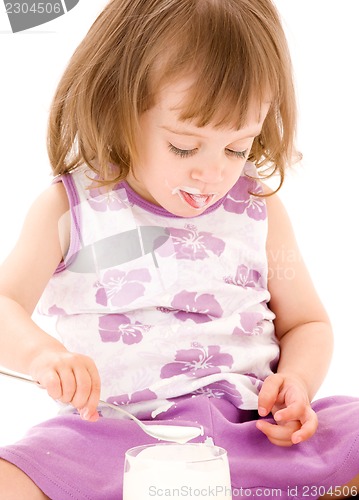 Image of little girl with yogurt