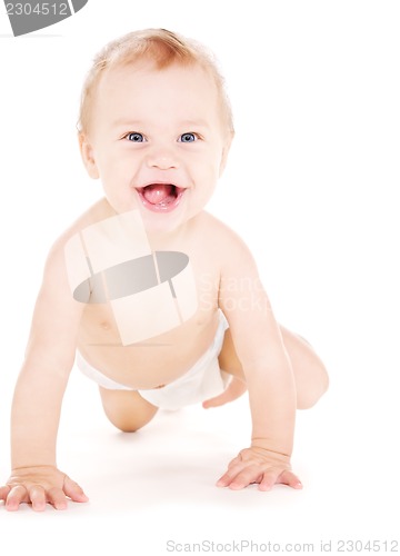 Image of crawling baby boy in diaper