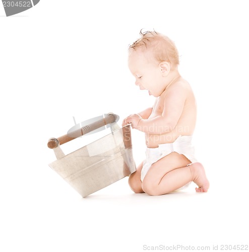 Image of baby boy with wash-tub