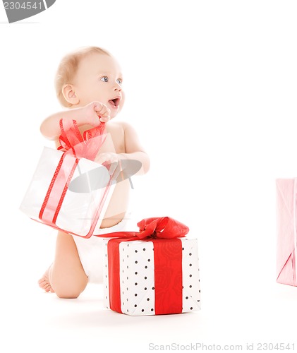 Image of baby boy with gifts