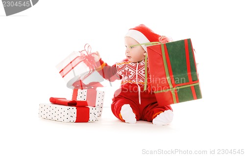 Image of santa helper baby with christmas gifts