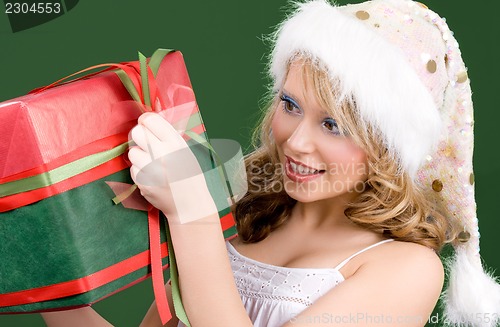 Image of happy santa helper with gift box