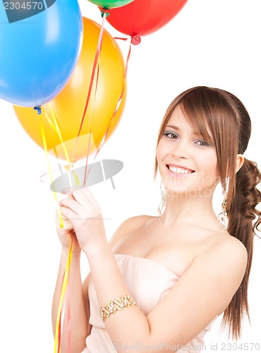 Image of happy teenage girl with balloons