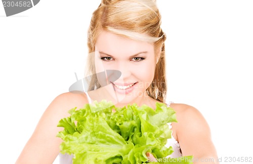 Image of happy woman with lettuce