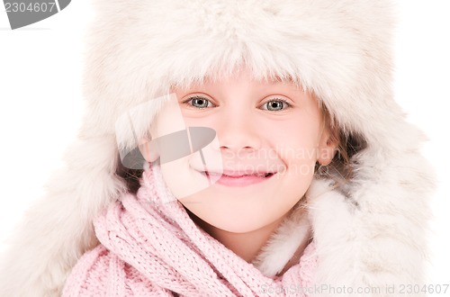 Image of happy girl in winter hat