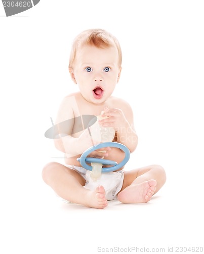 Image of baby boy with big pacifier