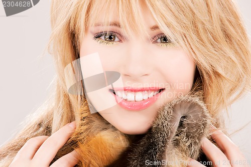 Image of lovely teenage girl in fur