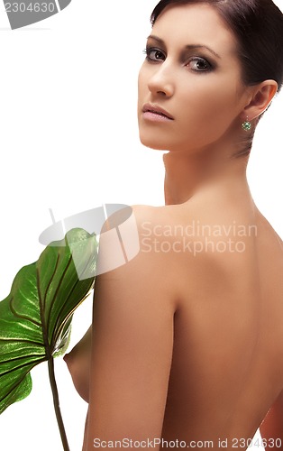 Image of woman with green leaf