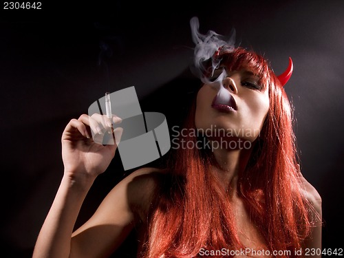 Image of smoking devil