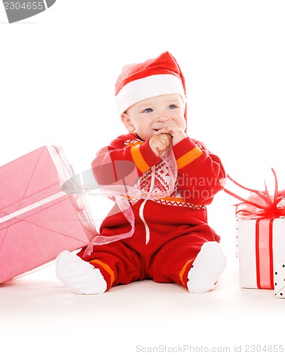 Image of santa helper baby with christmas gifts