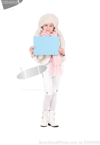 Image of girl in winter hat with blank board