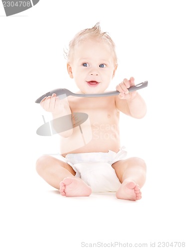 Image of baby boy with big spoon