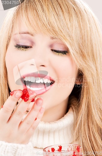 Image of happy teenage girl with raspberry jam