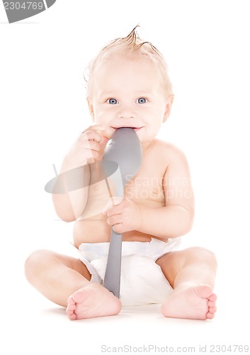 Image of baby boy with big spoon