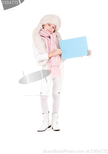 Image of girl in winter hat with blank board