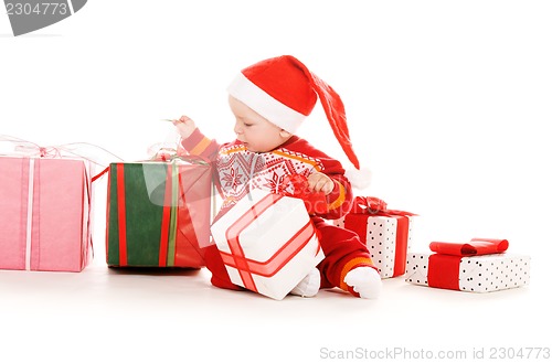 Image of santa helper baby with christmas gifts