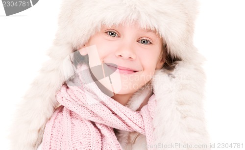 Image of happy girl in winter hat