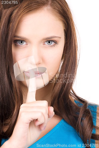 Image of finger on lips