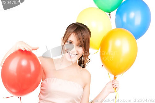 Image of happy teenage girl with balloons