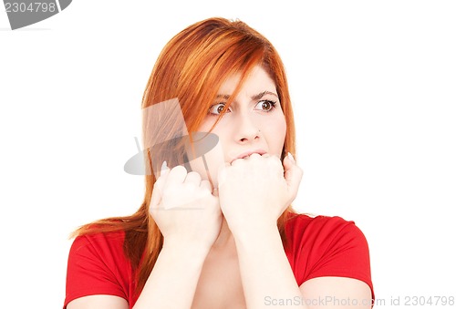 Image of unhappy redhead woman