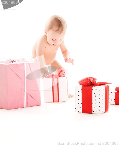 Image of baby boy with gifts