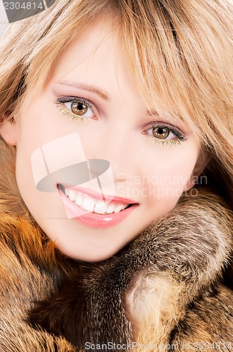 Image of lovely teenage girl in fur