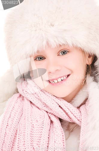 Image of happy girl in winter hat