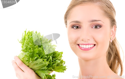 Image of happy woman with lettuce