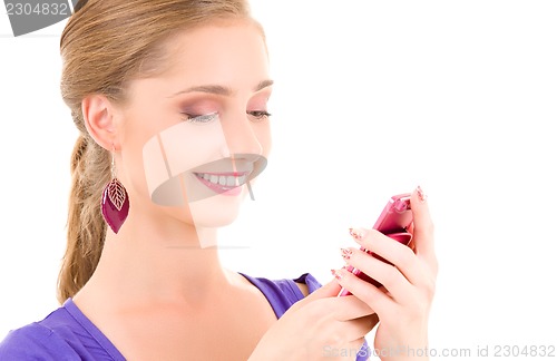 Image of happy teenage girl with cell phone