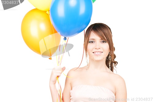 Image of happy teenage girl with balloons