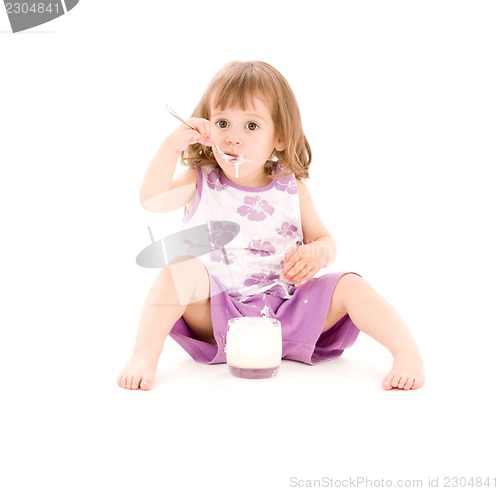 Image of little girl with yogurt