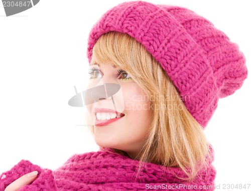 Image of happy teenage girl in hat