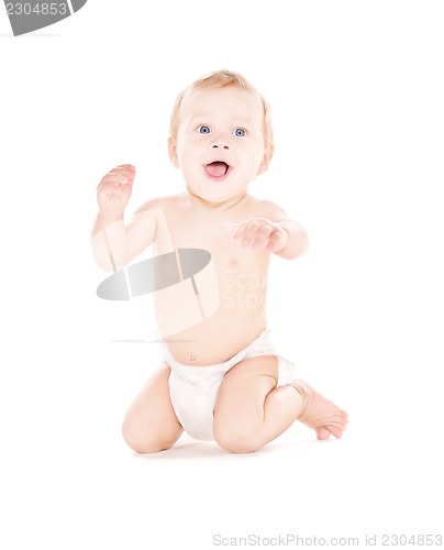 Image of sitting baby boy in diaper