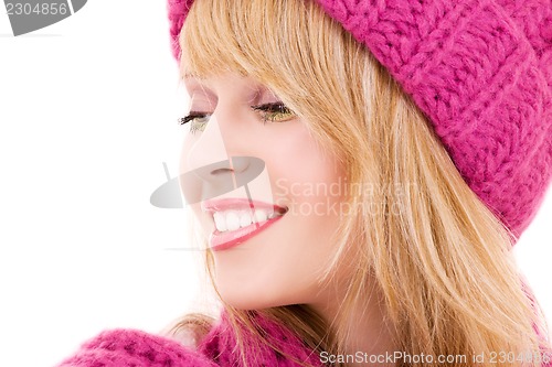 Image of happy teenage girl in hat