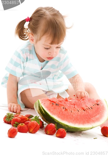 Image of little girl with strawberry and watermelon