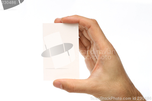 Image of Man holding a business card