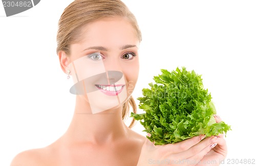 Image of happy woman with lettuce
