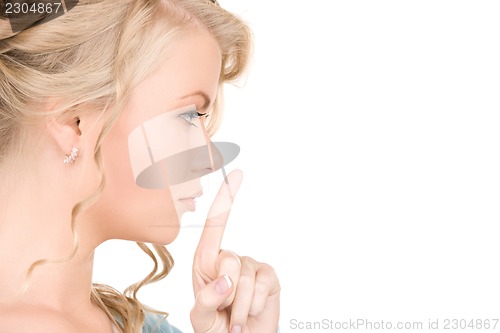 Image of finger on lips