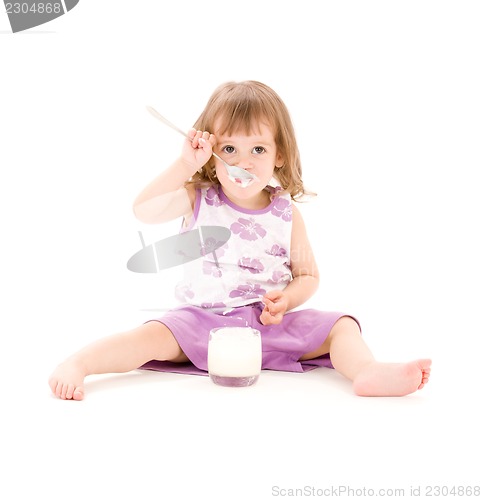 Image of little girl with yogurt