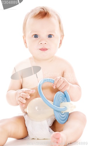 Image of baby boy with big pacifier