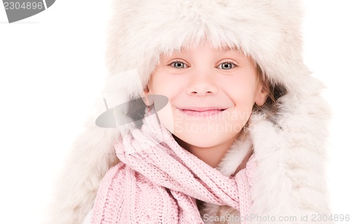 Image of happy girl in winter hat