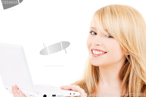 Image of teenage girl with laptop computer