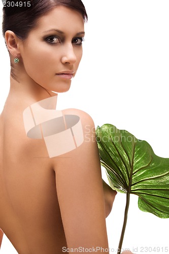 Image of woman with green leaf