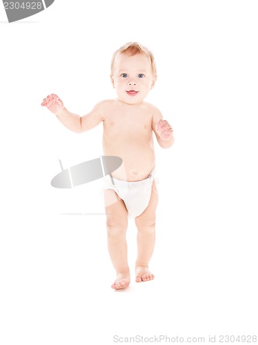 Image of standing baby boy in diaper